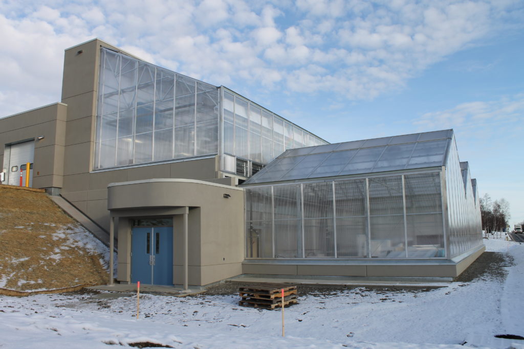exterior shot of greenhouse in snowy climate
